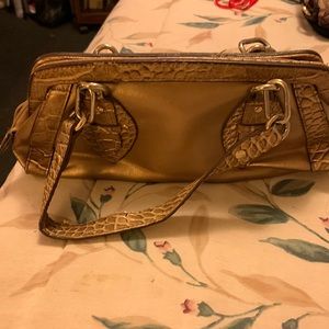 Small bag by Worthington. Gold color. In good condition